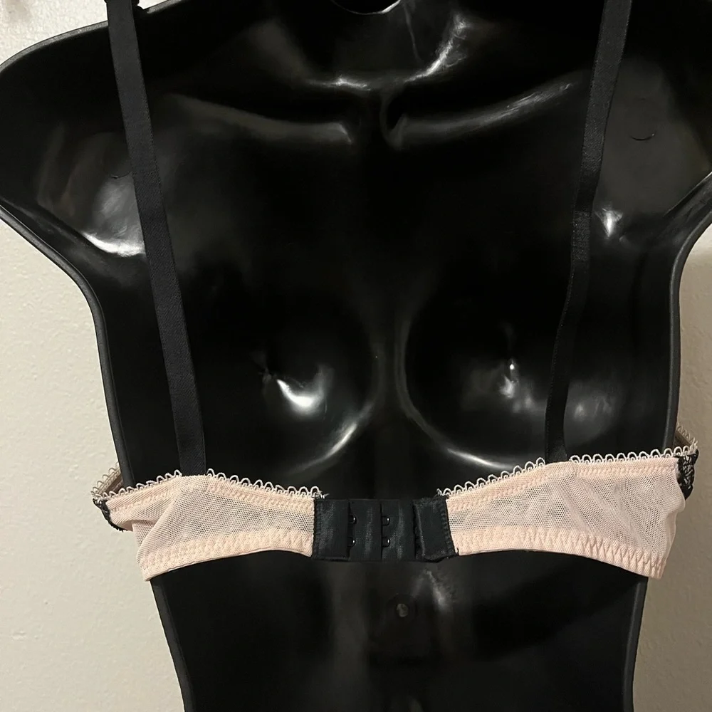 BLACKHEART bra new with partial tags.  Black and nude color. Underwire. 36B